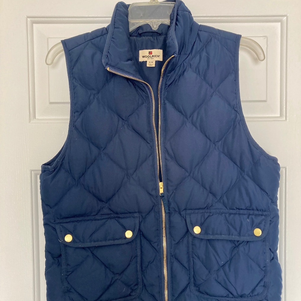 Quilted navy vest with gold accents